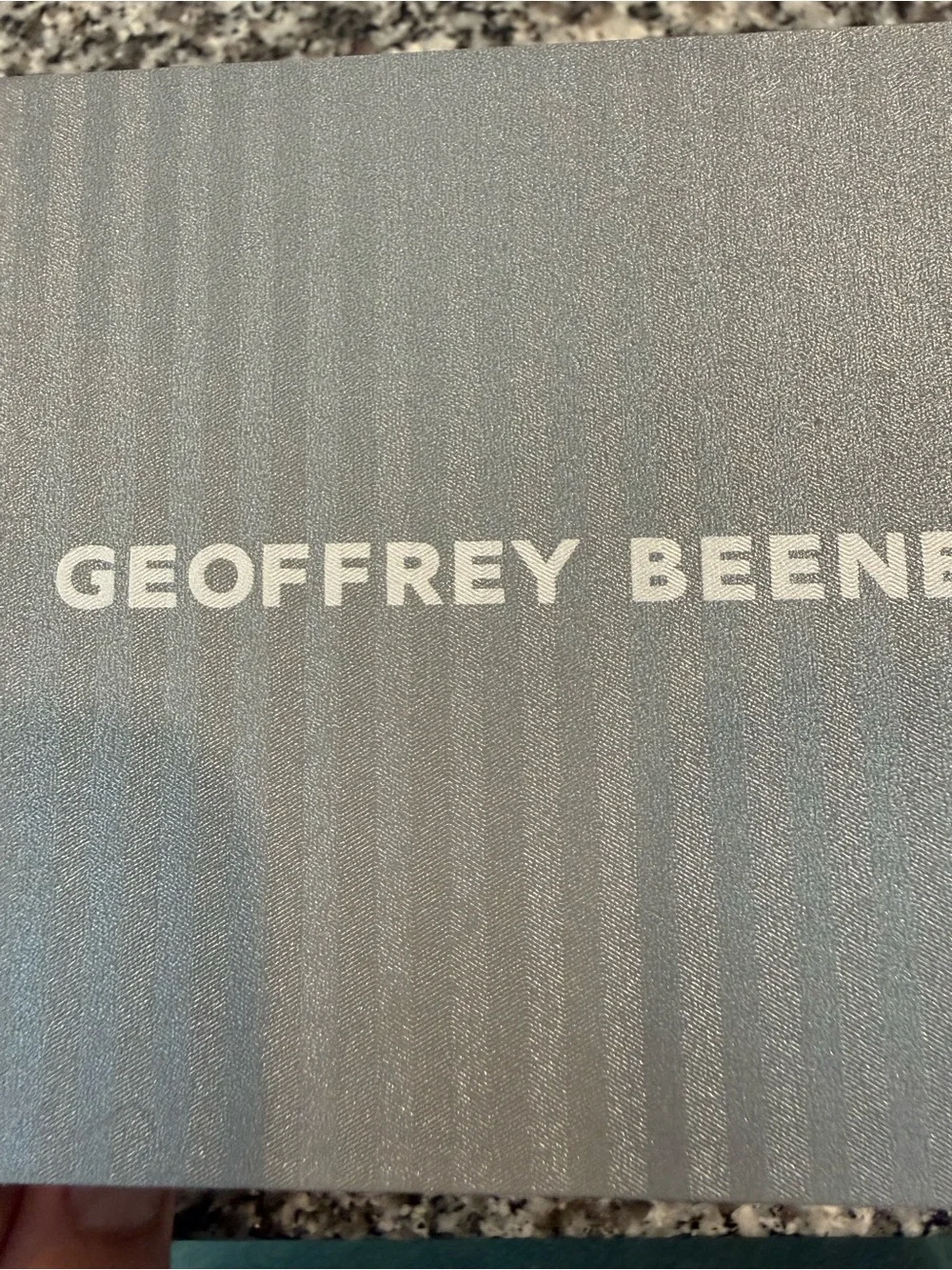 Geoffrey Beene Black and Silver Wall Clock